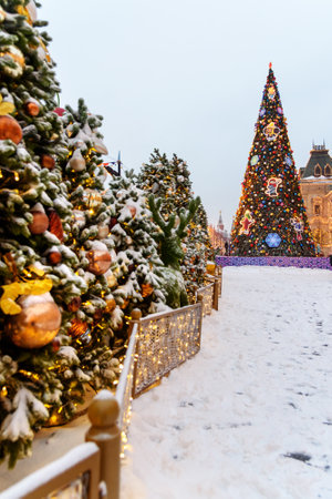 Moscow, Russia - January 26, 2019: Beautiful decorated and christmas tree with illumination on Red Square near GUM in the eveningのeditorial素材