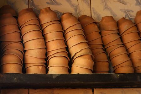 Clay tea cups for Indian chai tea in stall on the street. Kolkata. India