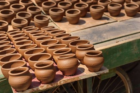 Clay pots in on the street of Pottery town is old place in Bangalore. Indiaの写真素材