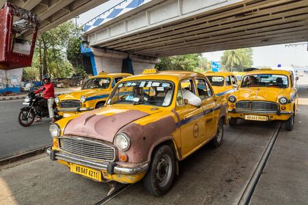 Kolkata, India - March 12, 2019: Yellow Ambassador taxi of Kolkata on roadのeditorial素材