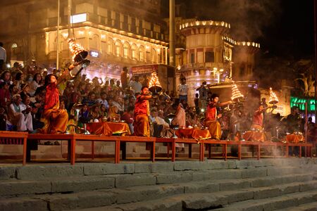 Varanasi, India - March 16, 2019: Ganga aarti ceremony rituals at Assi Ghat in Varanasiのeditorial素材