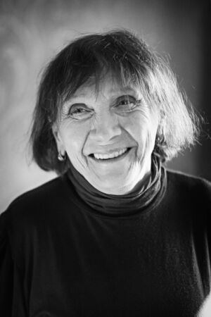Portrait of happy senior woman of 70 years old. Black and white portrait