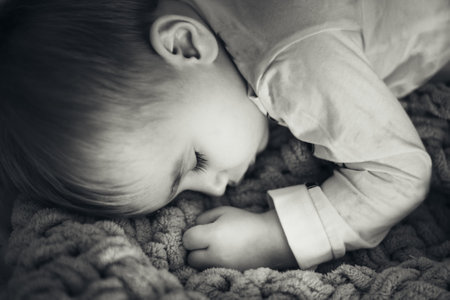 Little boy sleeping at home. Soft focusの写真素材