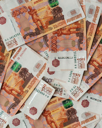 Background of Russian cash banknotes of five thousand rubles. Top viewsの写真素材