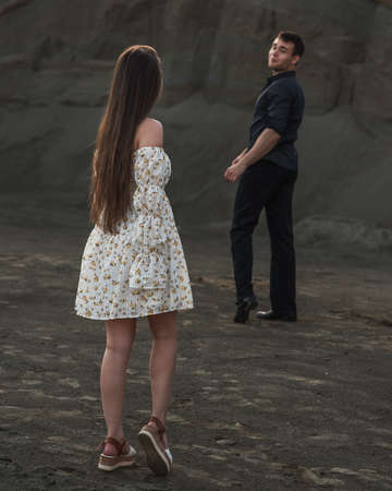 Couple of lovers outdoor on gray sand background. Selectiv focusの写真素材