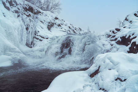 Visimo-Utkinsky waterfall in winter. Ural. Russiaの写真素材