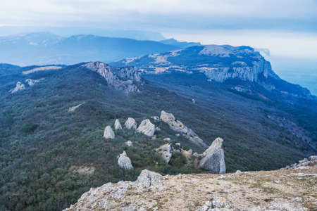 View of Temple of the Sun, Tyshlar rocks from top of Ilyas-Kaya mountain in spring. Crimeaの写真素材