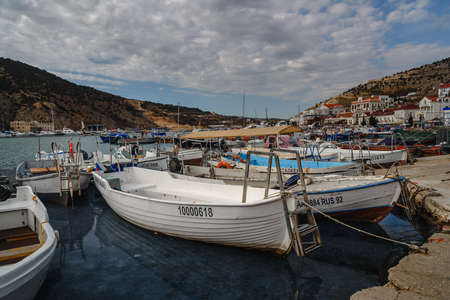 Sevastopol, Crimea - March 15, 2021: Parking boats and yachts at Balaklava bay in springのeditorial素材
