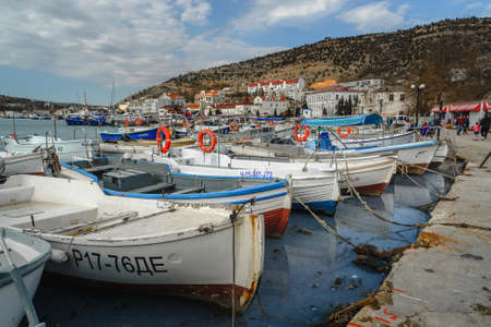 Sevastopol, Crimea - March 15, 2021: Parking boats and yachts at Balaklava bay in springのeditorial素材