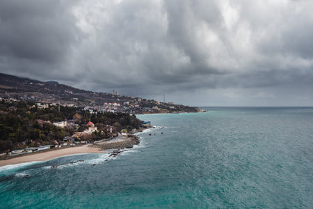 View from a rock Diva at city beach on cloudy weather dayin spring. Simeiz, Crimeaの写真素材