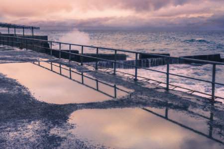 Black Sea in rainy stormy weather in spring at sunset. Alupka, Crimeaの写真素材
