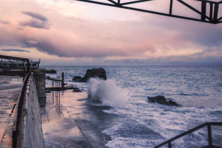 Black Sea in rainy stormy weather in spring at sunset. Alupka, Crimeaの写真素材