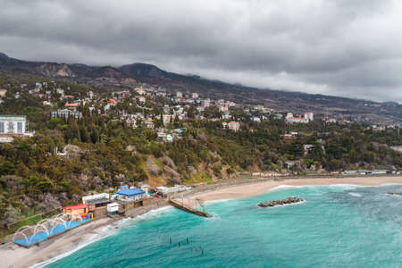 View from a rock Diva at city beach on cloudy weather dayin spring. Simeiz, Crimea