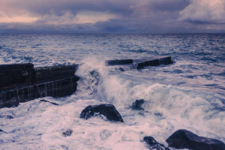 Black Sea in rainy stormy weather in spring at sunset. Alupka, Crimeaの写真素材
