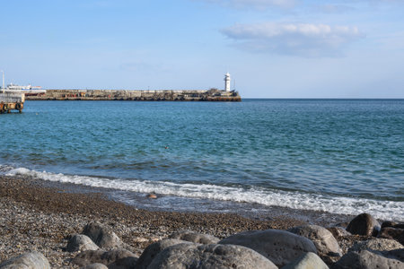 View of old Yalta lighthouse from embankment. Yalta, Crimeaの写真素材