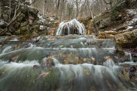 Diferent cascades of Djur-Djur waterfall on Ulu-Uzen river in early spring with snow. Khapkhalskiy canyon in Crimeaの写真素材