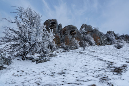 On top of Mount Alenga near Southern Demerdzhi in snow and ice in early spring. Crimeaの写真素材