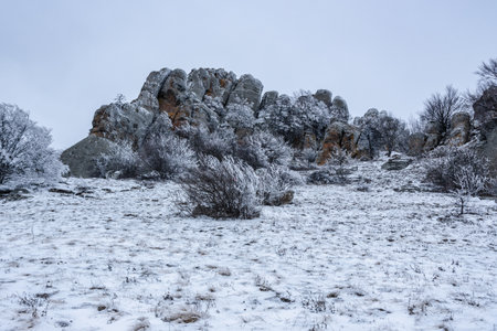 Mount Alenga near Southern Demerdzhi in snow and ice in early spring. Crimeaの写真素材