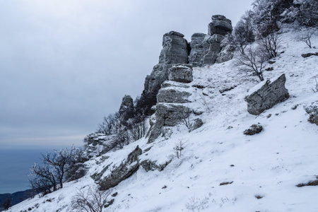 Mount Alenga near Southern Demerdzhi in snow and ice in early spring. Crimeaの写真素材
