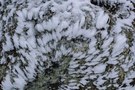 Ice frost on stone texture. Winter abstract background. snow surfaceの写真素材