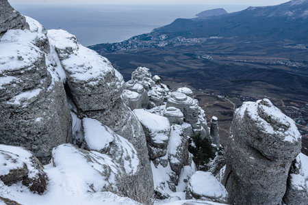 View on rocks in snow from top of Mount Alenga. Southern Demerdzhi in early spring. Crimeaの写真素材