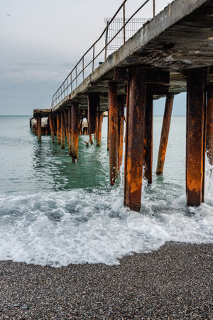 Old broken down pier on the beach of Alushta. Crimeaの写真素材