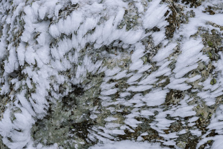 Ice frost on stone texture. Winter abstract background. snow surfaceの写真素材