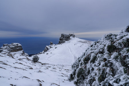 View on the top of Mount Alenga. Southern Demerdzhi in snow and ice early spring. Crimeaの写真素材