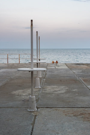 Empty promenade with tables in spring in Koktebel. Crimeaの写真素材