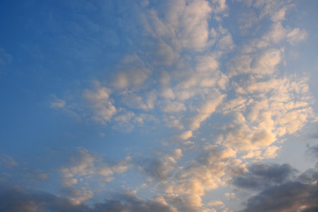 Sunrise sky with light clouds, background, textureの写真素材