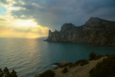 View of Karaul-Oba mountain, Cape Chicken-Kaya and Blue bay on sunset in spring. Novy Svet. Crimeaの写真素材