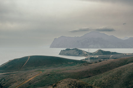 View from hills on of mountain Kara-dag, cape Chameleon, Quiet Bay in spring. Koktebel. Crimeaの写真素材