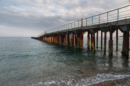 Old rusty pier in blue sea in spring. Koktebel. Crimeaの写真素材