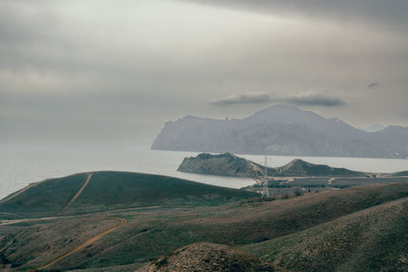 View from hills on of mountain Kara-dag, cape Chameleon, Quiet Bay in spring. Koktebel. Crimeaの写真素材