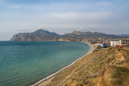 View of seaside resort city Koktebel , mountain Kara Dag from hills in spring. Crimeaの写真素材