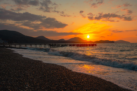 View of sunrise on Koktebel beach. Crimeaの写真素材