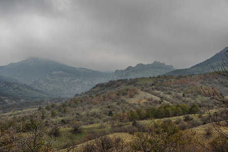 Territory of Karadag Reserve in spring. View of ridge Shuryu-kai rock on cloudy day. Crimeaの写真素材