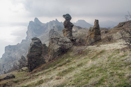 Gingerbread horse rock and bizarre rocks in Dead city. Khoba-Tele Ridge of Karadag Reserve in early spring. Crimeaの写真素材