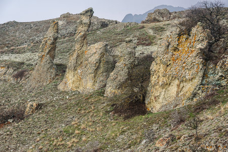 Gingerbread horse rock and bizarre rocks in Dead city. Khoba-Tele Ridge of Karadag Reserve in early spring. Crimeaの写真素材
