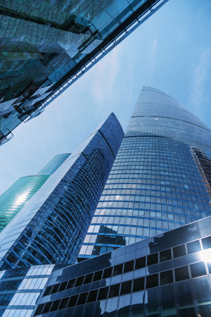 Skyscrapers in business district Moscow City. Bottom up view of the towers on blue sky background. Moscow. Russiaの写真素材