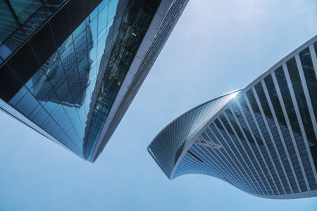 Skyscrapers in business district Moscow City. Bottom up view of the towers on blue sky background. Moscow. Russiaの写真素材