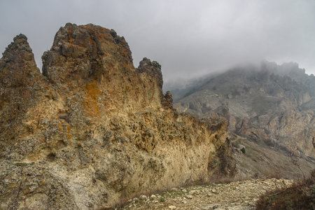 Landscape of Karadag Reserve in spring. View of rocks of ridge Karagach on cloudy day. Crimeaの写真素材
