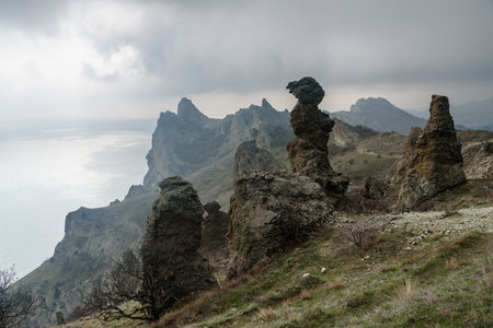 Gingerbread horse rock and bizarre rocks in Dead city. Khoba-Tele Ridge of Karadag Reserve in early spring. Crimeaの写真素材