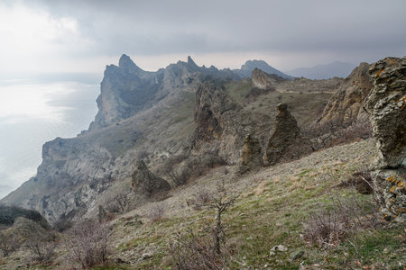 Bizarre rocks in Dead city. Khoba-Tele Ridge of Karadag Reserve in early spring. Crimeaの写真素材