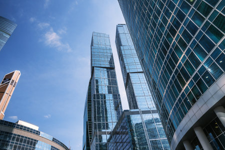 Skyscrapers in business district Moscow City. Bottom up view of the towers on blue sky background. Moscow. Russiaの写真素材