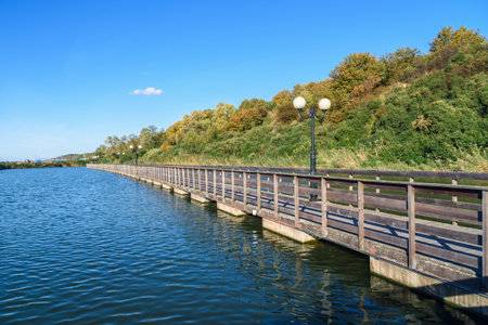 Wooden long promenade along the Baltic Sea coast. Yantarny. Kaliningrad region. Russiaの写真素材