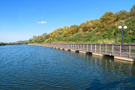 Wooden long promenade along the Baltic Sea coast. Yantarny. Kaliningrad region. Russiaの写真素材