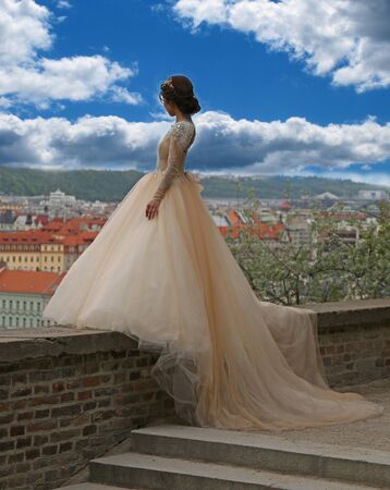 Bride in the sky with cloudsの写真素材