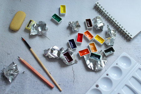 A set of materials for drawing. Watercolors, art brushes, palette. Hobby. Ready-made design for painting lessons.の写真素材