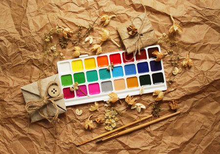 A set of materials for drawing. Watercolor paints, artistic brushes.の写真素材